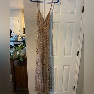 Lulus gold glittery low cut gown never worn size small